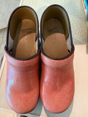 Dansko Coral Pebbled Leather Clogs with Dark Trim